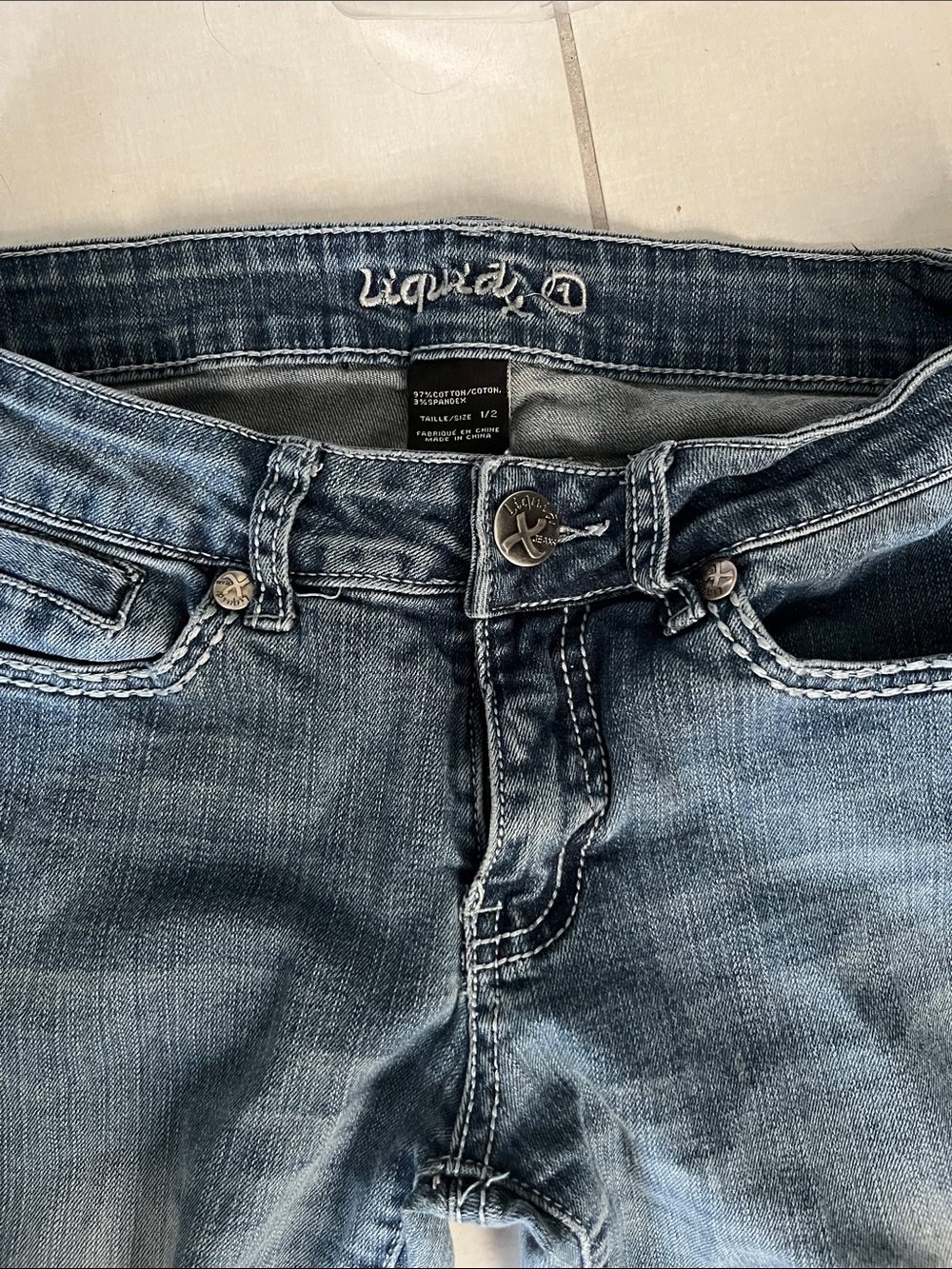 Jeans liquid distressed with embellishments. Vintage y2k